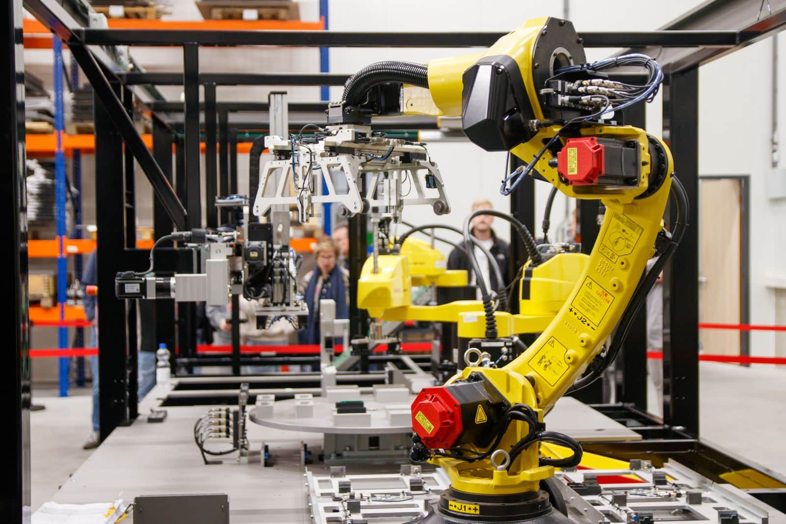 Industrial robot arm joints exposed before fitting protective robot sleeves and bellows