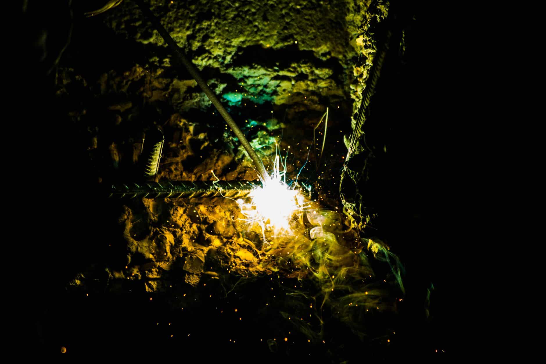 Welding spatter reaching a robot arm, the fastest source of cover wear