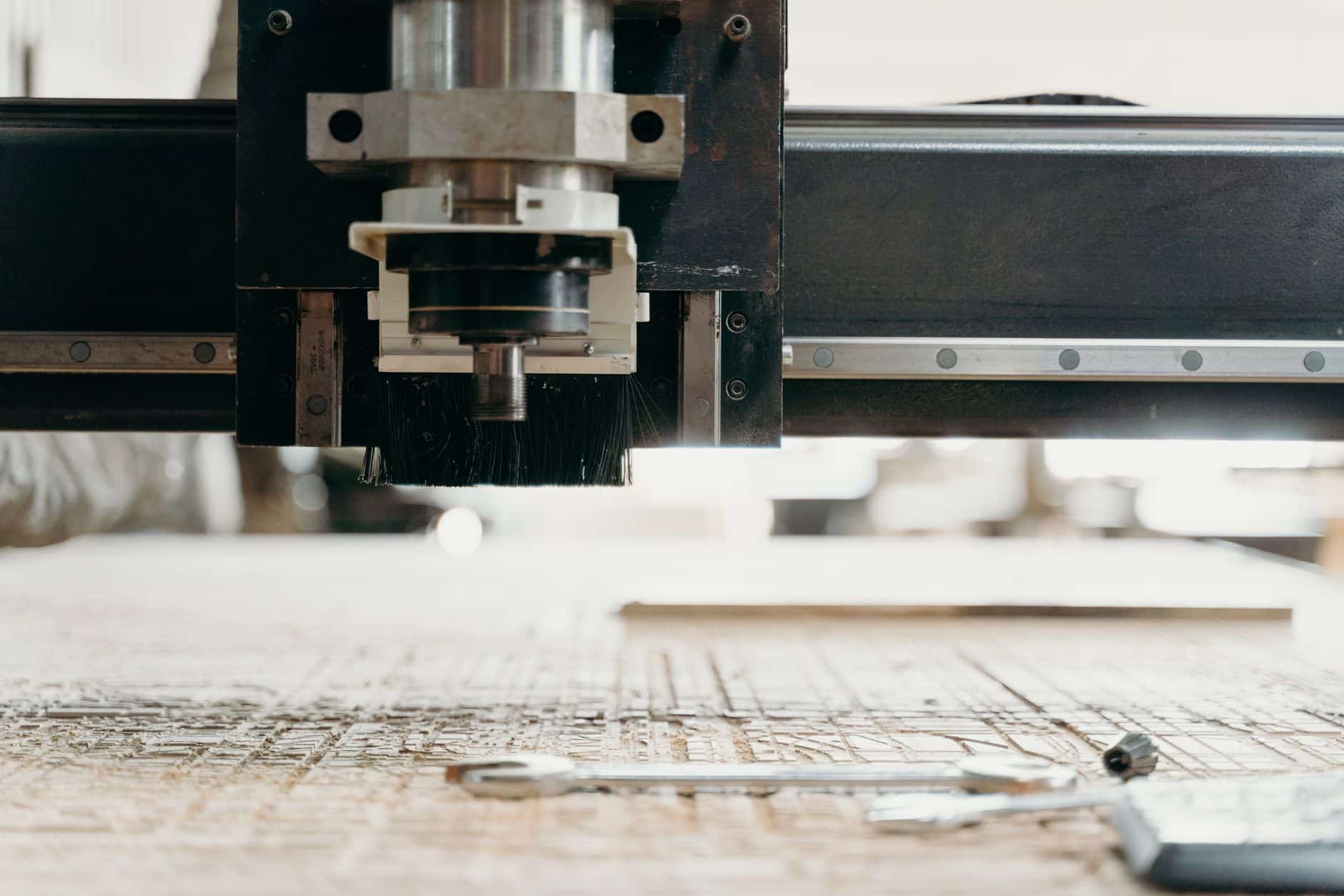CNC machine under a breathable cover during sheltered outdoor storage