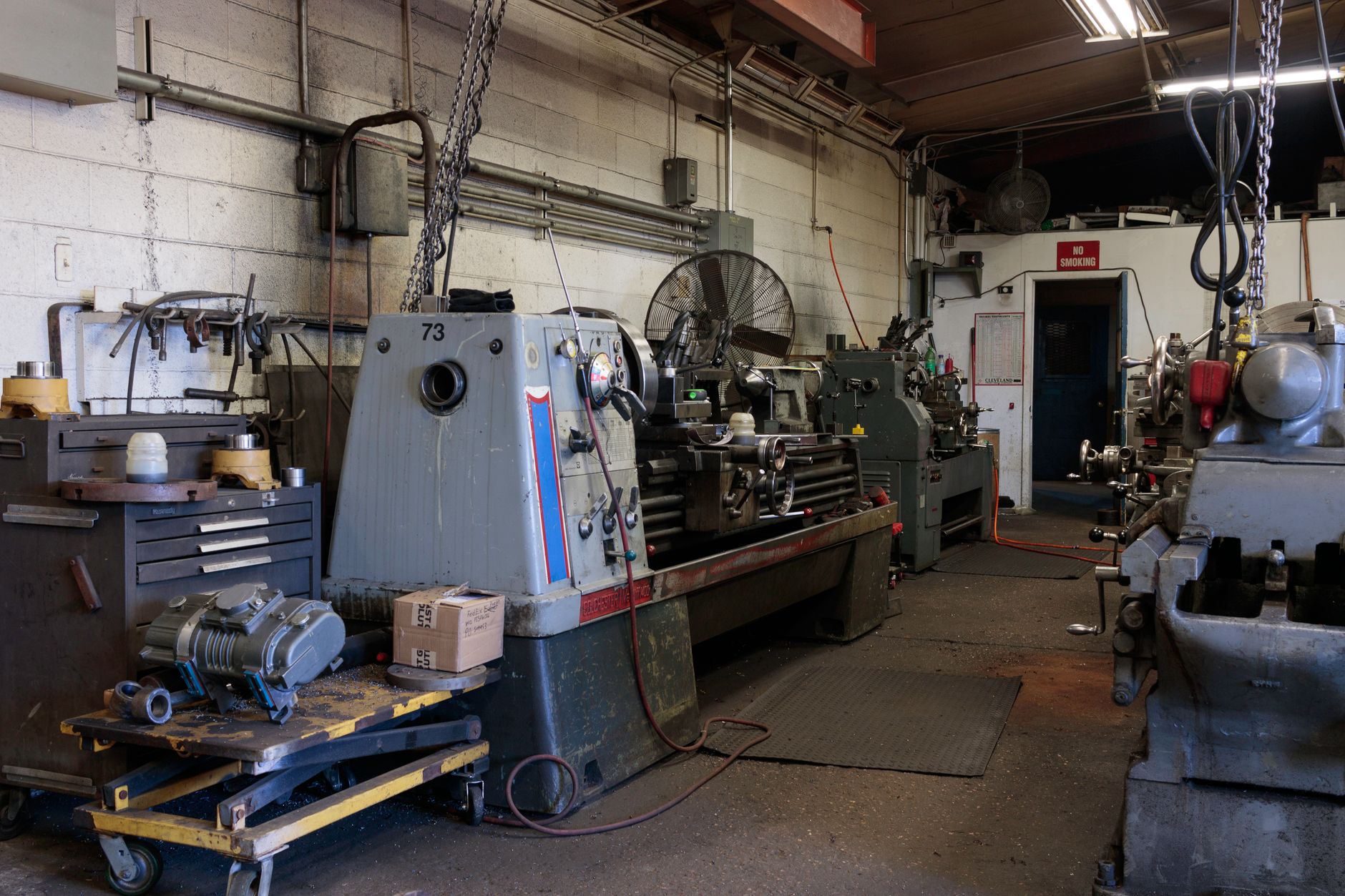 Workshop with industrial machines that need protective covers