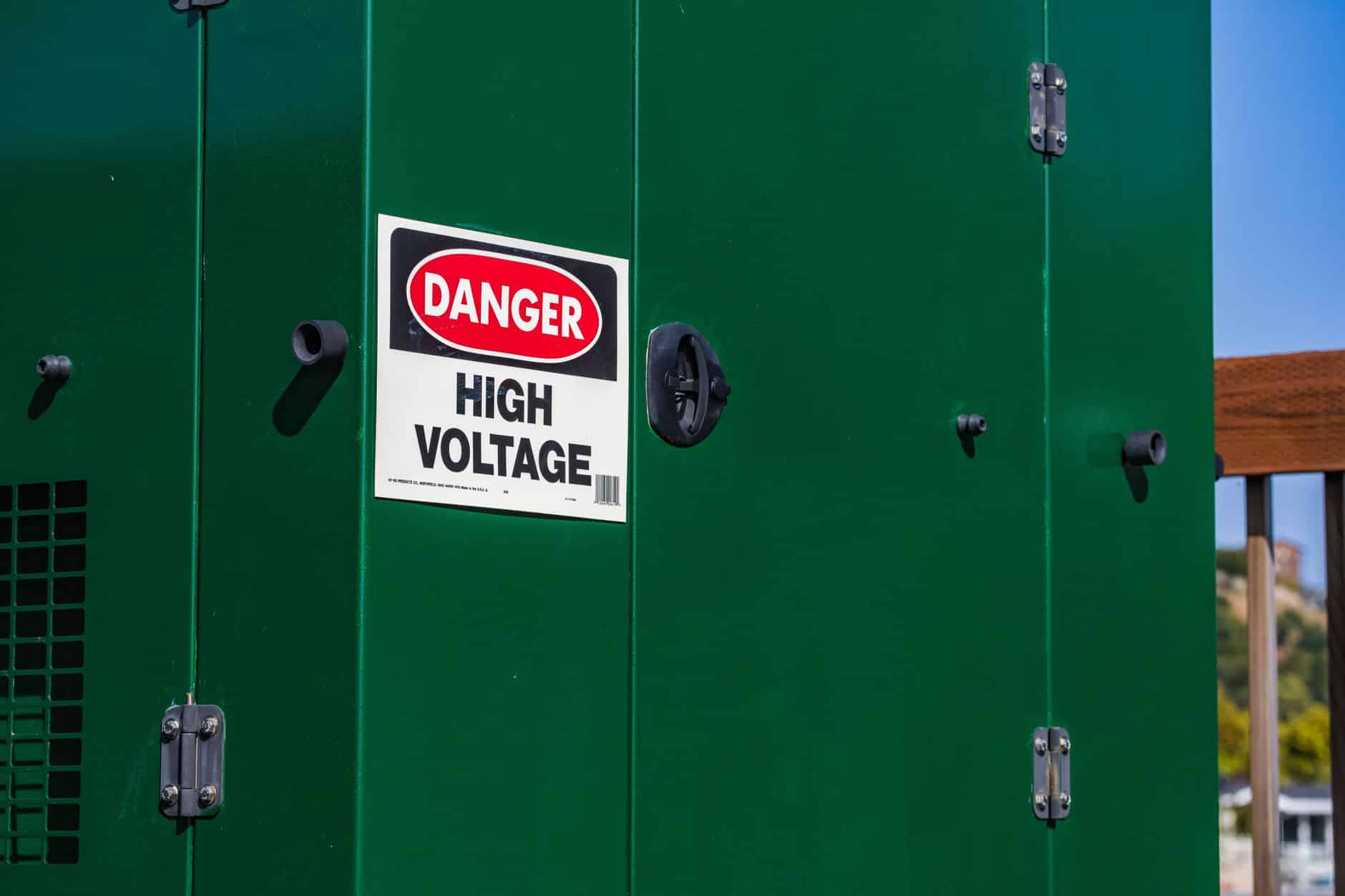 Industrial machine protected outdoors under a custom weatherproof cover